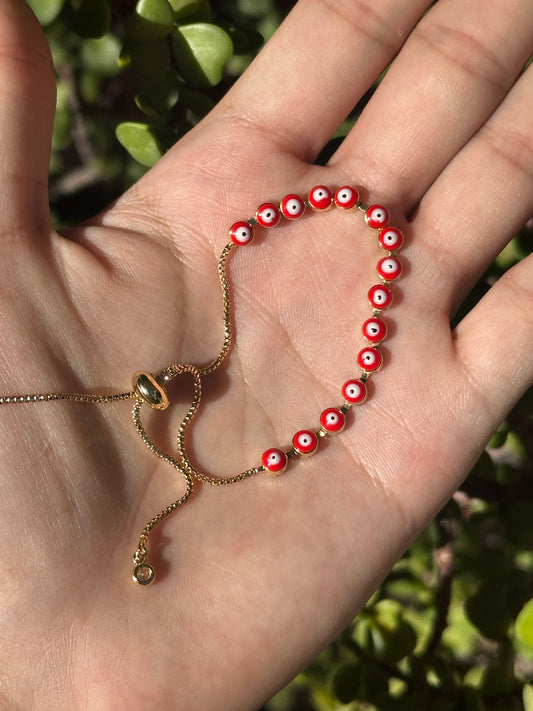 Pulsera Ajustable de Acero Inoxidable con Ojos Turcos Rojos