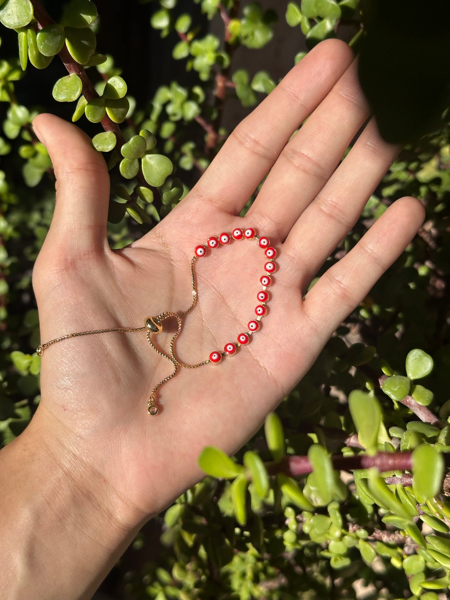 Pulsera Ajustable de Acero Inoxidable con Ojos Turcos Rojos