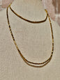 Collar largo de hematita dorada cubo mini