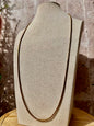 Collar largo de hematita dorada